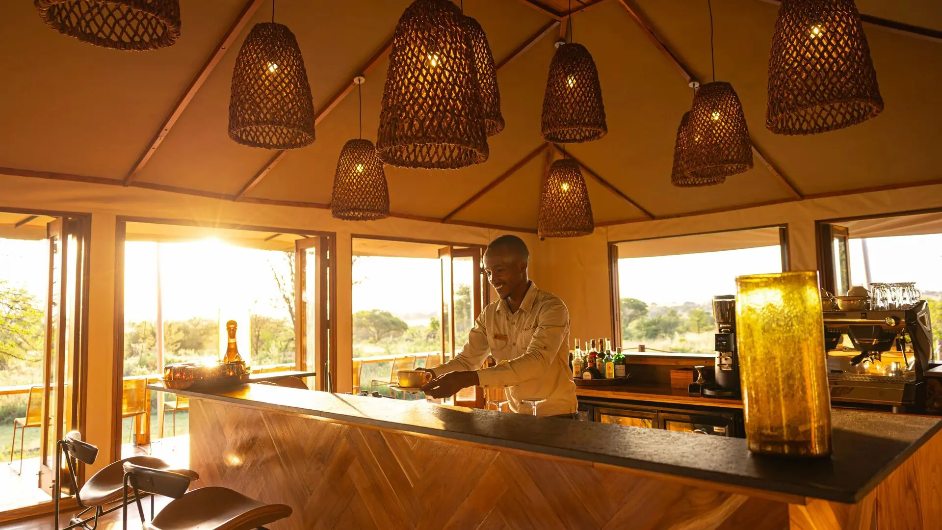 Elegant safari lodge lounge at dusk